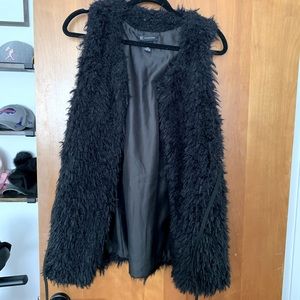 Black faux fur vest